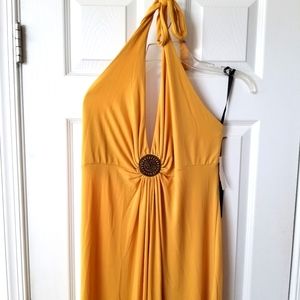 Mustard yellow high quality sun dress. Draping rayon blend with brass center.